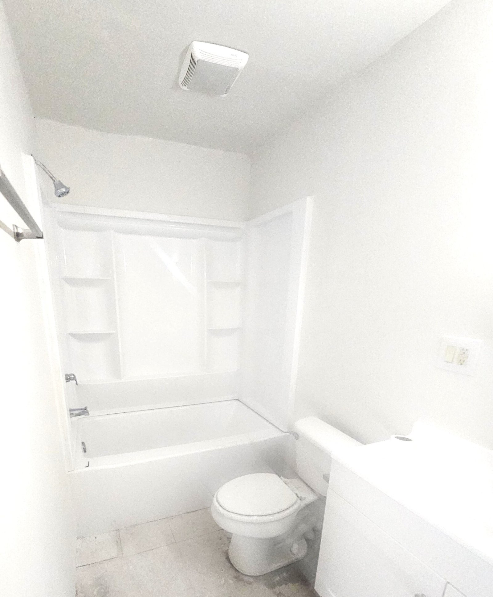 Basic bathroom remodel — plastic tub surround installed